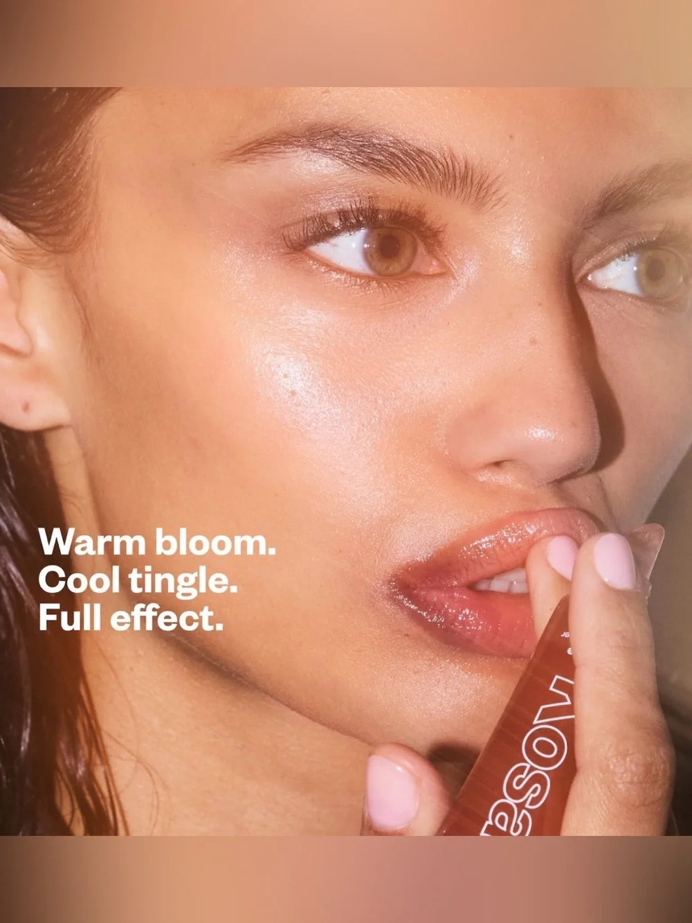 KOSAS Lip Pulse Glassy Lip Plumper Gloss Aura Flare clear with iridescent pink